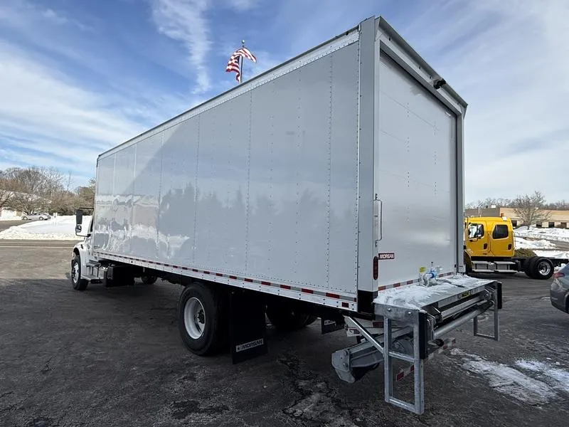 A 2025 Freightliner M2 106 at a commercial loading dock, the working environment for Illyro's freight services.